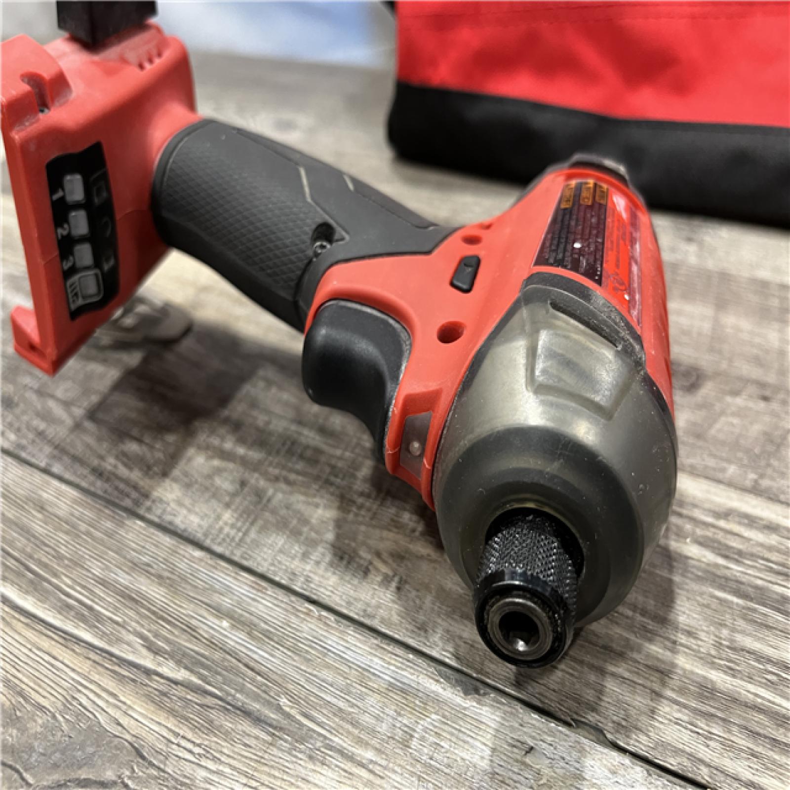 AS-IS Milwaukee FUEL SURGE 18-Volt Lithium-Ion Brushless Cordless 1/4 in. Hex Impact Driver Compact Kit