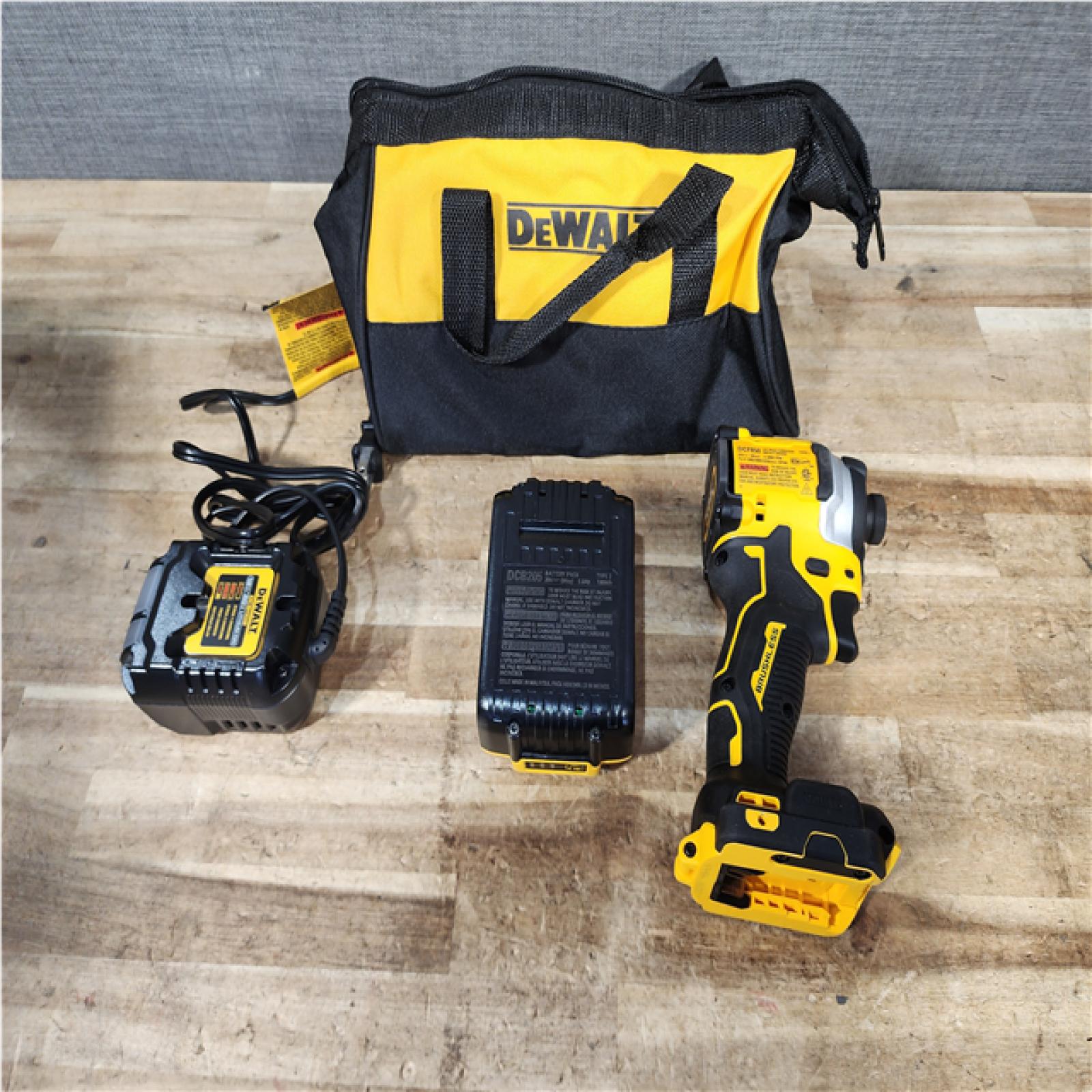 Houston Location AS-IS DEWALT ATOMIC 20V MAX Lithium-Ion Cordless 1/4 in. Brushless Impact Driver Kit