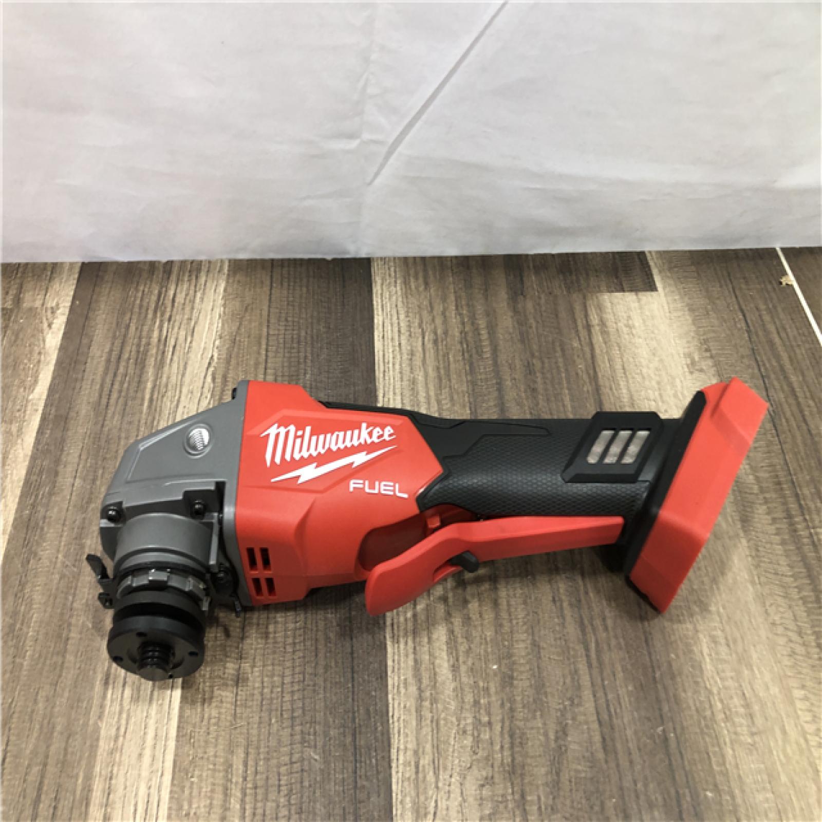 AS-IS Milwaukee FUEL 18V Lithium-Ion Brushless Cordless 4-1/2 in./5 in. Grinder with Variable Speed & Paddle Switch (Tool-Only)