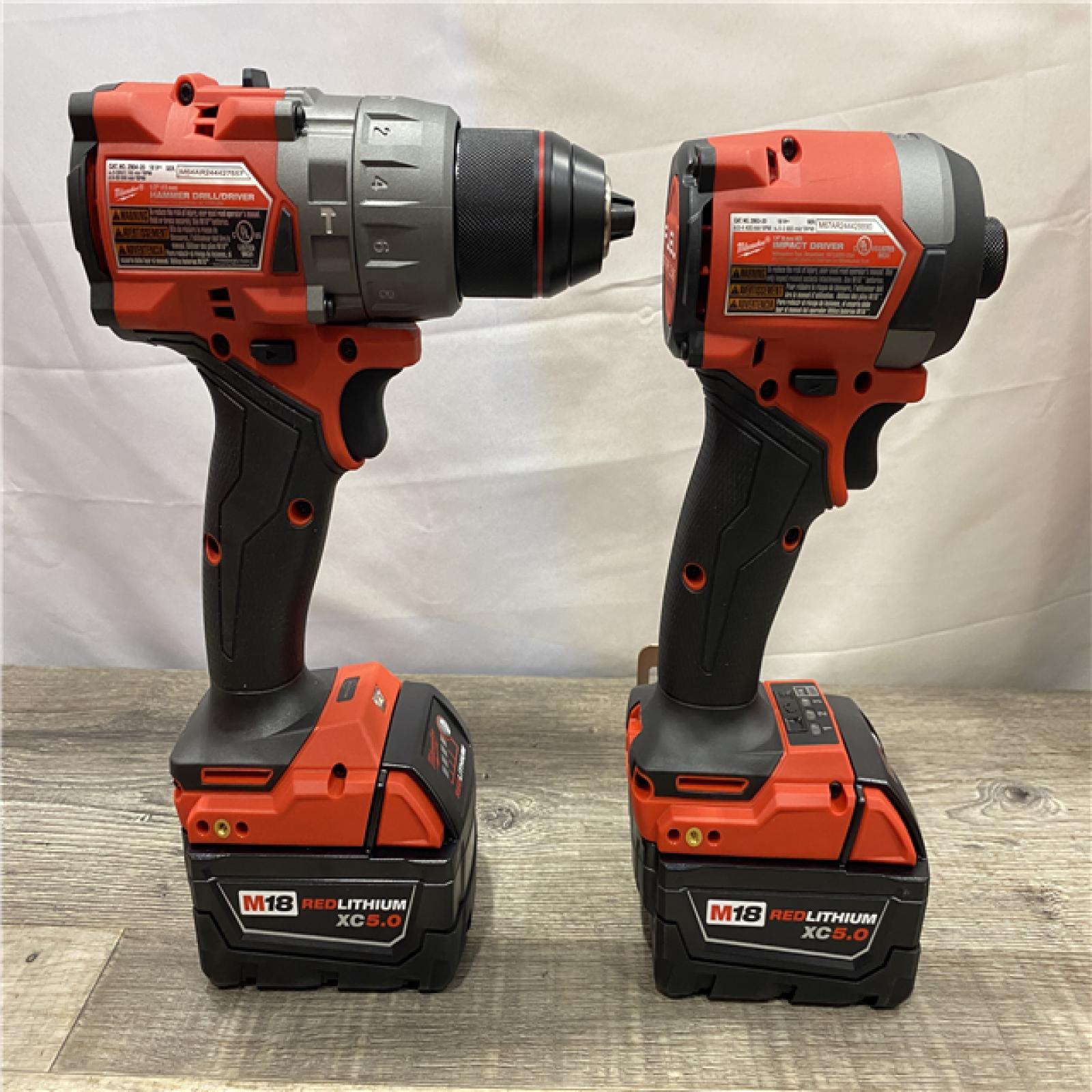 AS-IS Milwaukee FUEL 18V Lithium-Ion Brushless Cordless Hammer Drill and Impact Driver Combo Kit