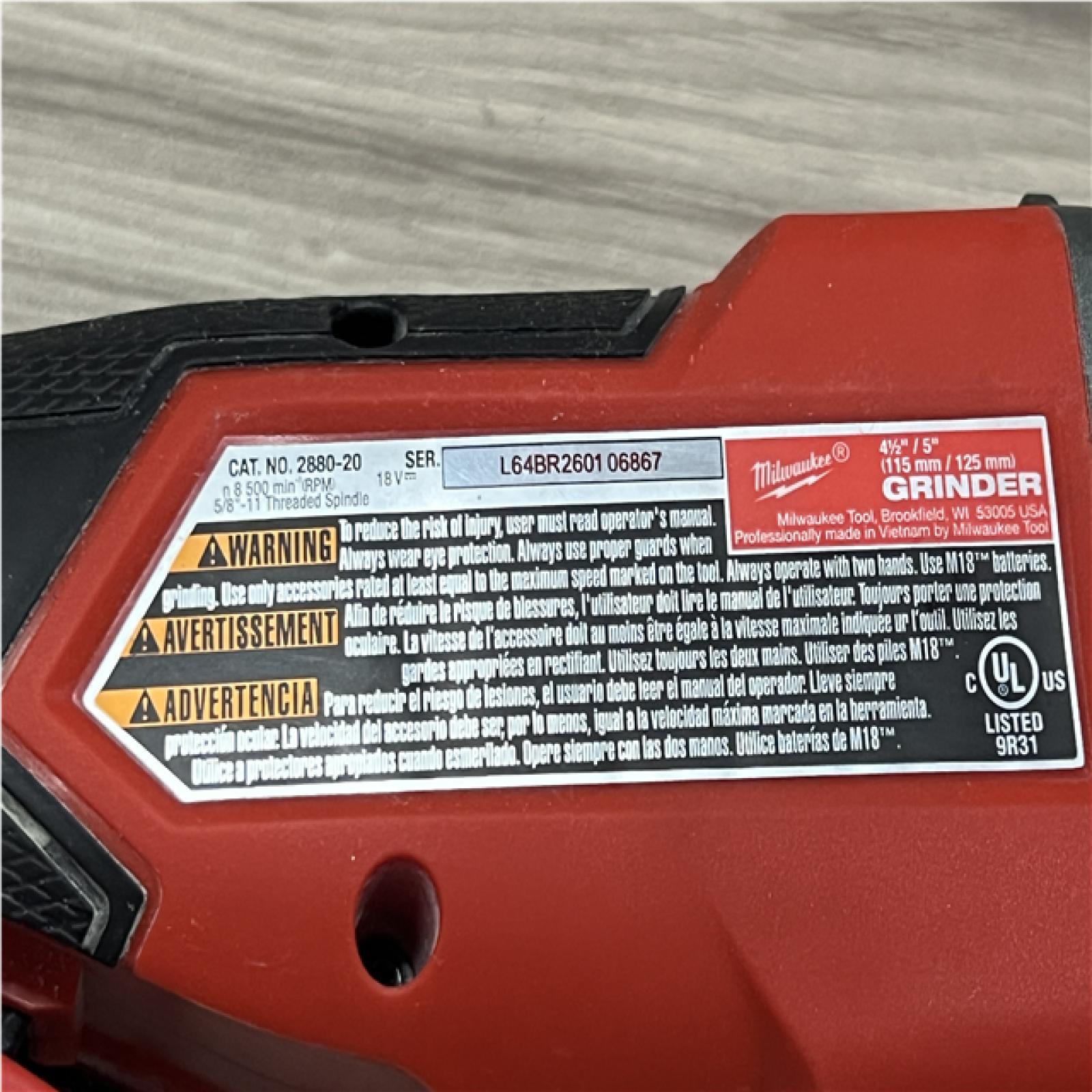 AS-IS Milwaukee FUEL 18V Lithium-Ion Brushless Cordless 4-1/2 in./5 in. Grinder w/Paddle Switch (Tool-Only)