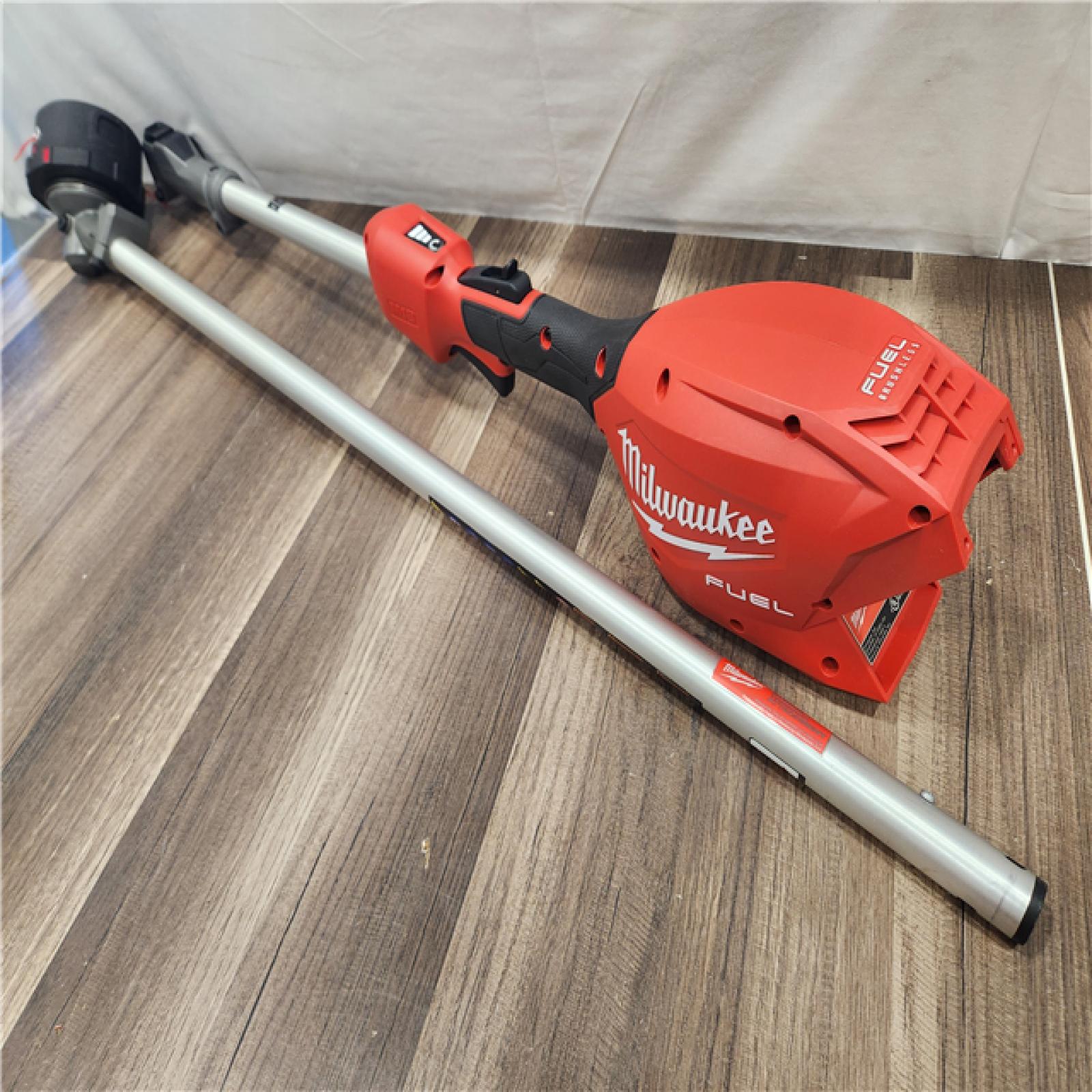 AS-IS- M18 FUEL 18V 16 in. Brushless Cordless Battery Powered String Trimmer W/QUIK-LOK Attachment Capability & 8.0 Ah Battery