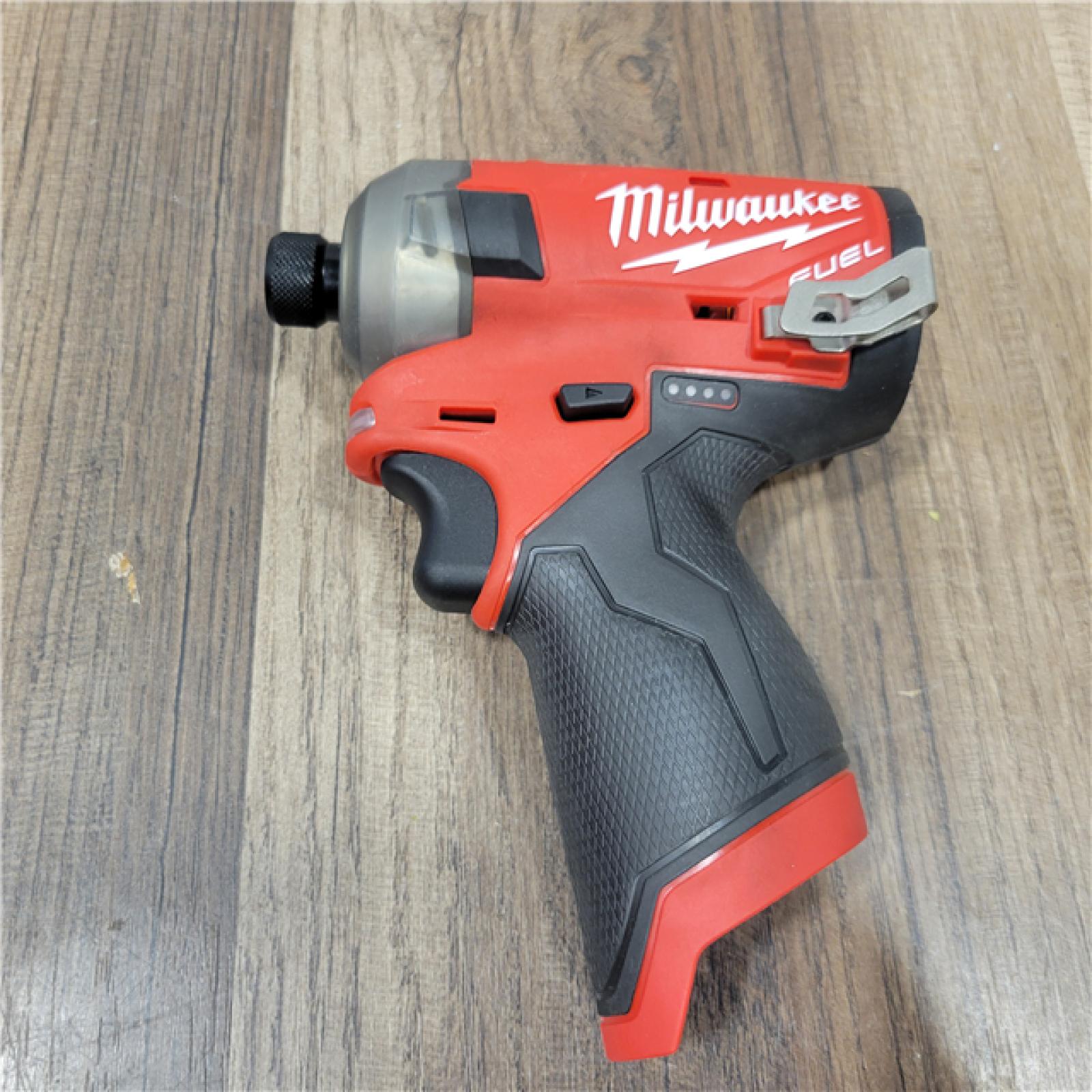 AS-IS Milwaukee M12 FUEL SURGE 12V Lithium-Ion Brushless Cordless 1/4 in. Hex Impact Driver Compact Kit W/Two 2.0Ah Batteries, Bag