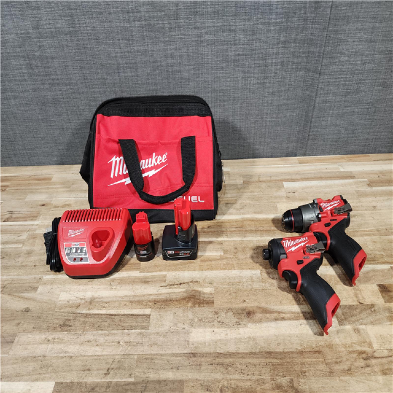 HOUSTON LOCATION - AS-IS (APPEARS LIKE NEW) Milwaukee FUEL 12-Volt Lithium-Ion Brushless Cordless Hammer Drill and Impact Driver Combo Kit