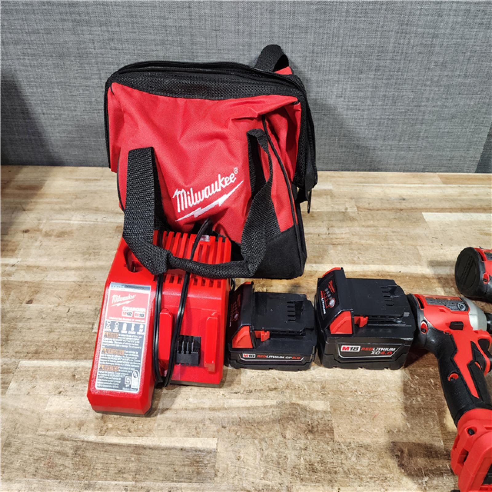 HOUSTON LOCATION - AS - IS Milwaukee 18-Volt Lithium-Ion Brushless Cordless Compact Hammer Drill/Impact Combo Kit