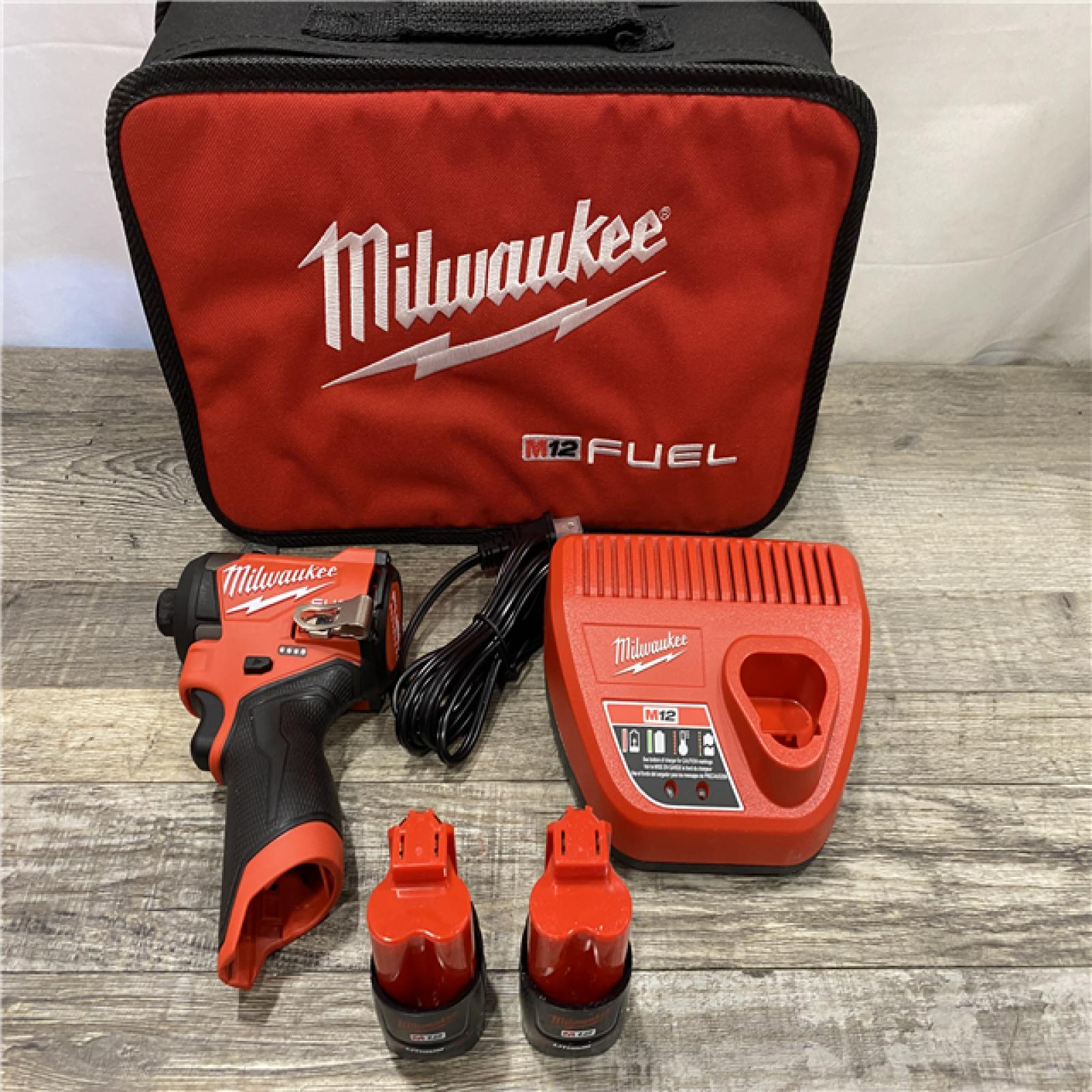 AS-IS Milwaukee  FUEL 12V Lithium-Ion Brushless Cordless 1/4 in. Hex Impact Driver Kit