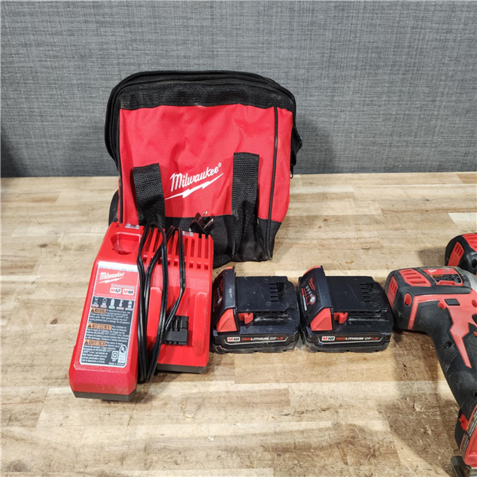 HOUSTON LOCATION - AS - IS Milwaukee 18V Lithium-Ion Cordless Drill Driver/Impact Driver Combo Kit
