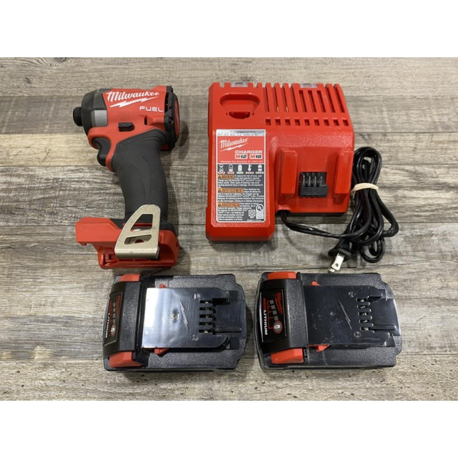 AS-IS Milwaukee FUEL 18V Lithium-Ion Brushless Cordless 1/4 in. Hex Impact Driver Kit