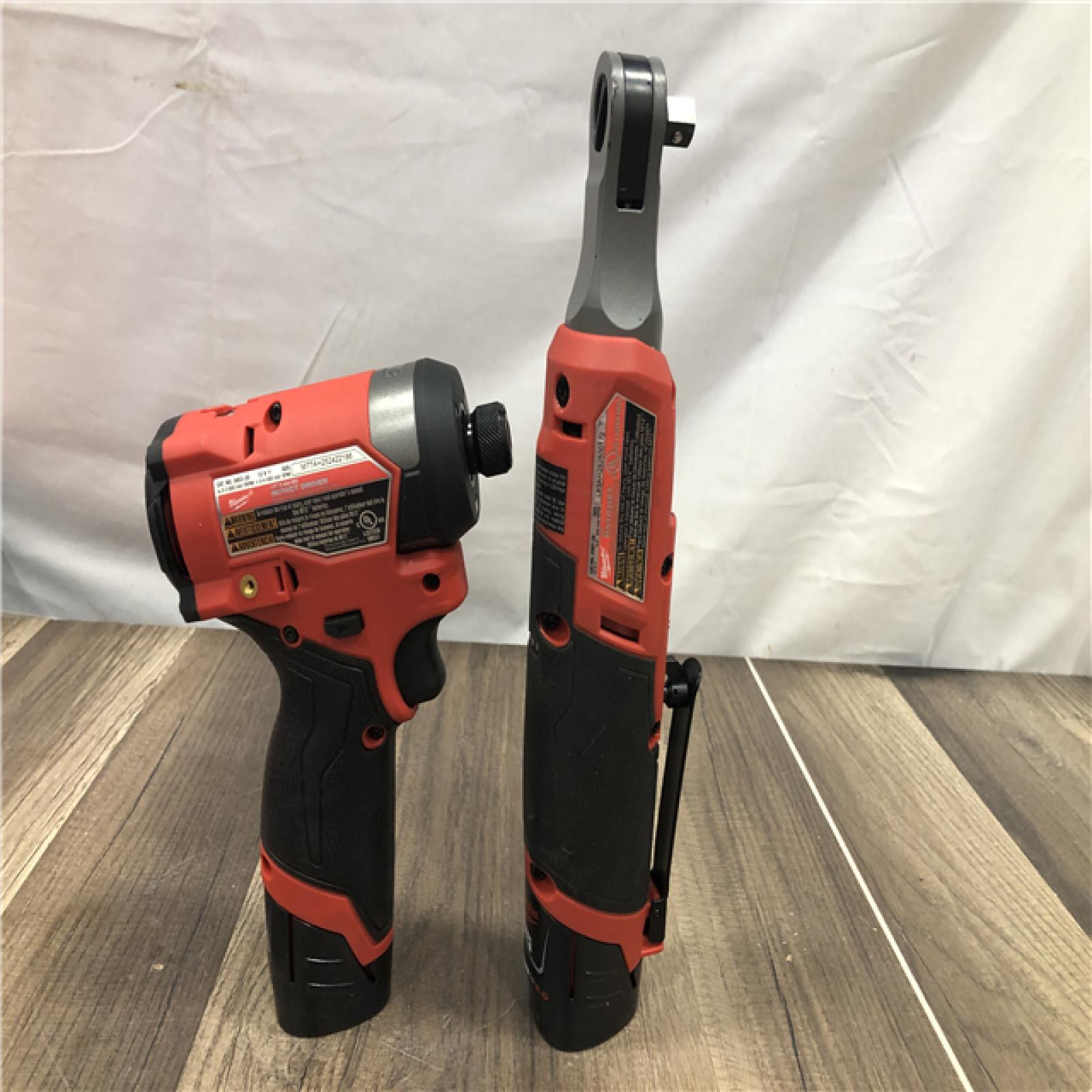 AS-IS Milwaukee FUEL 12V Lithium-Ion Cordless 3/8 in. Ratchet and 1/4 in. Impact Driver Kit