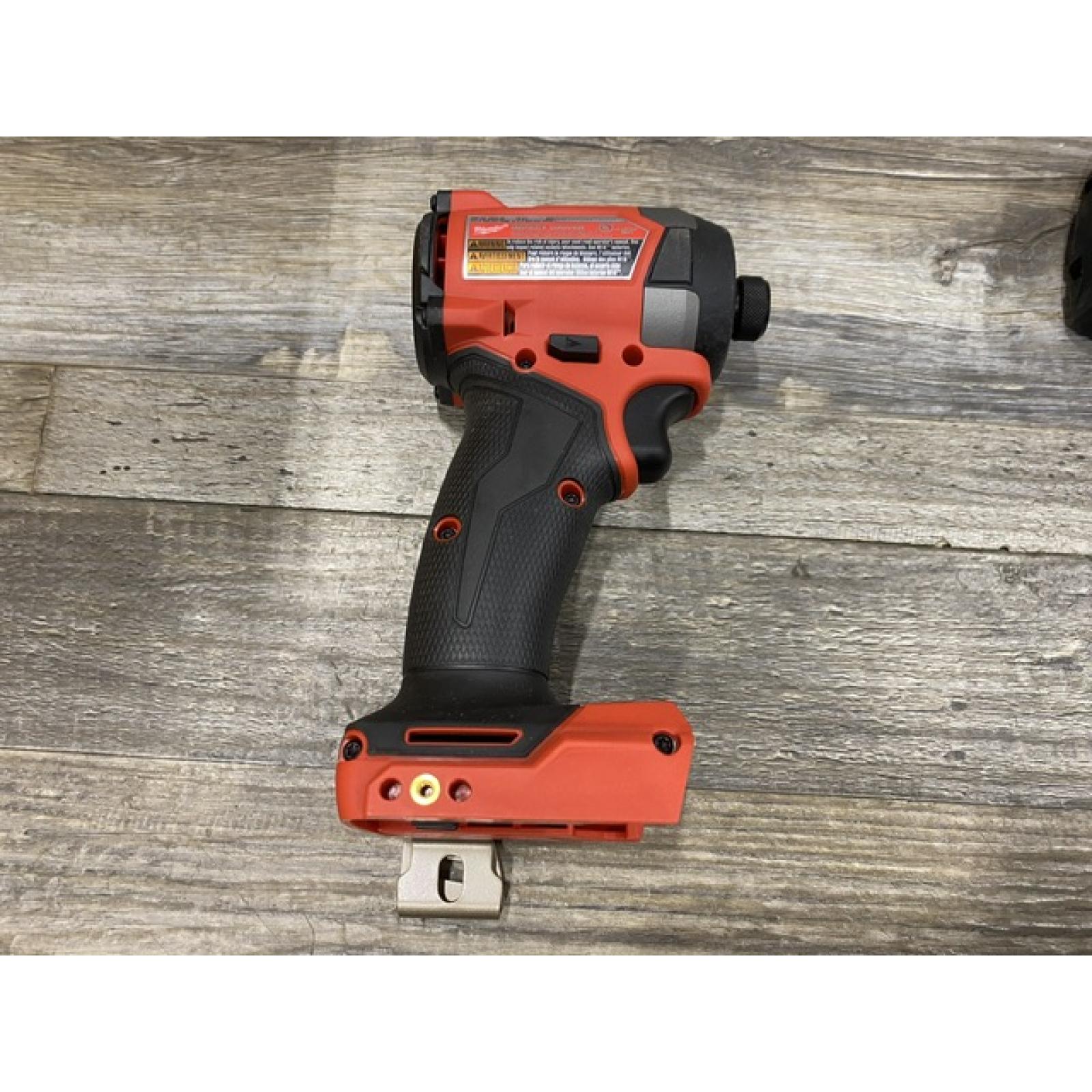 AS-IS Milwaukee FUEL 18V Lithium-Ion Brushless Cordless 1/4 in. Hex Impact Driver Kit