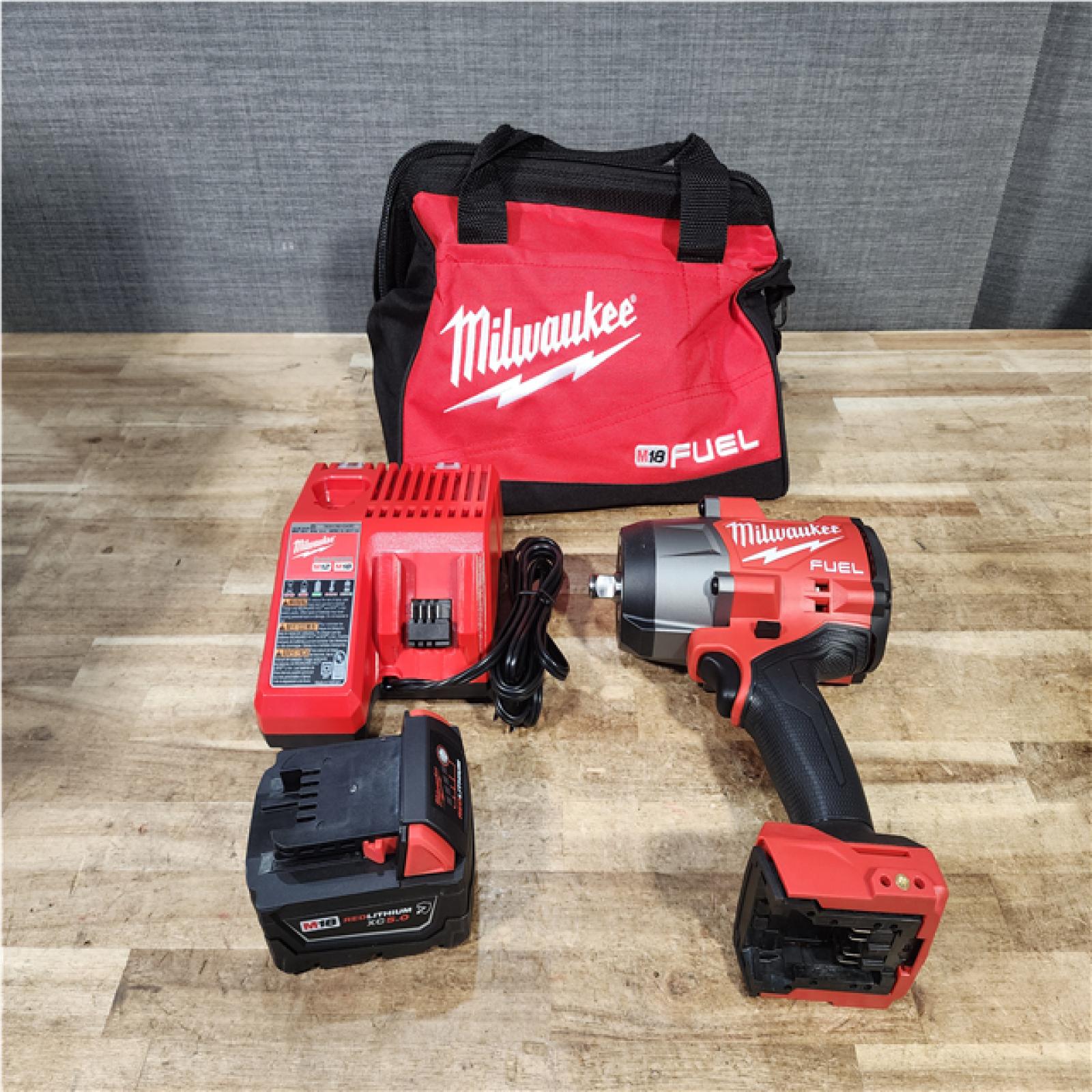 Houston Location AS-IS Milwaukee FUEL 18V Lithium-Ion Brushless Cordless 1/2 in. Impact Wrench w/Friction Ring Kit