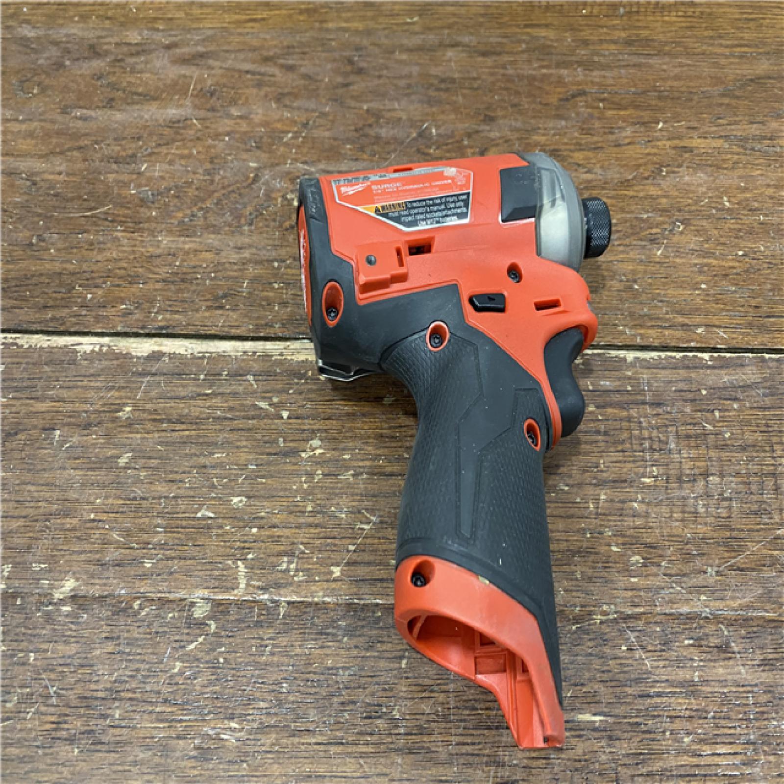 AS-IS M12 FUEL SURGE 12V Lithium-Ion Brushless Cordless 1/4 in. Hex Impact Driver Compact Kit W/Two 2.0Ah Batteries, Bag