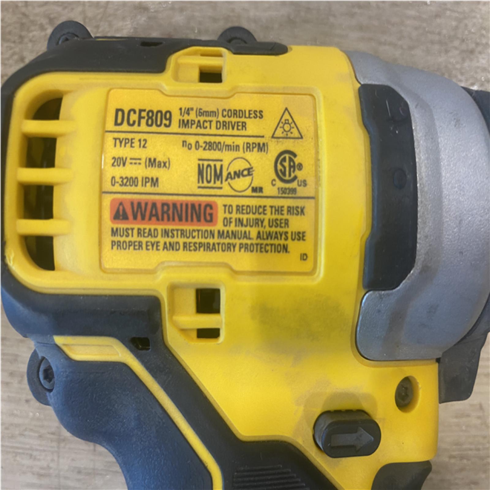 AS-IS DEWALT ATOMIC 20V MAX Cordless Brushless Compact 1/4 in. Impact Driver (Tool Only)