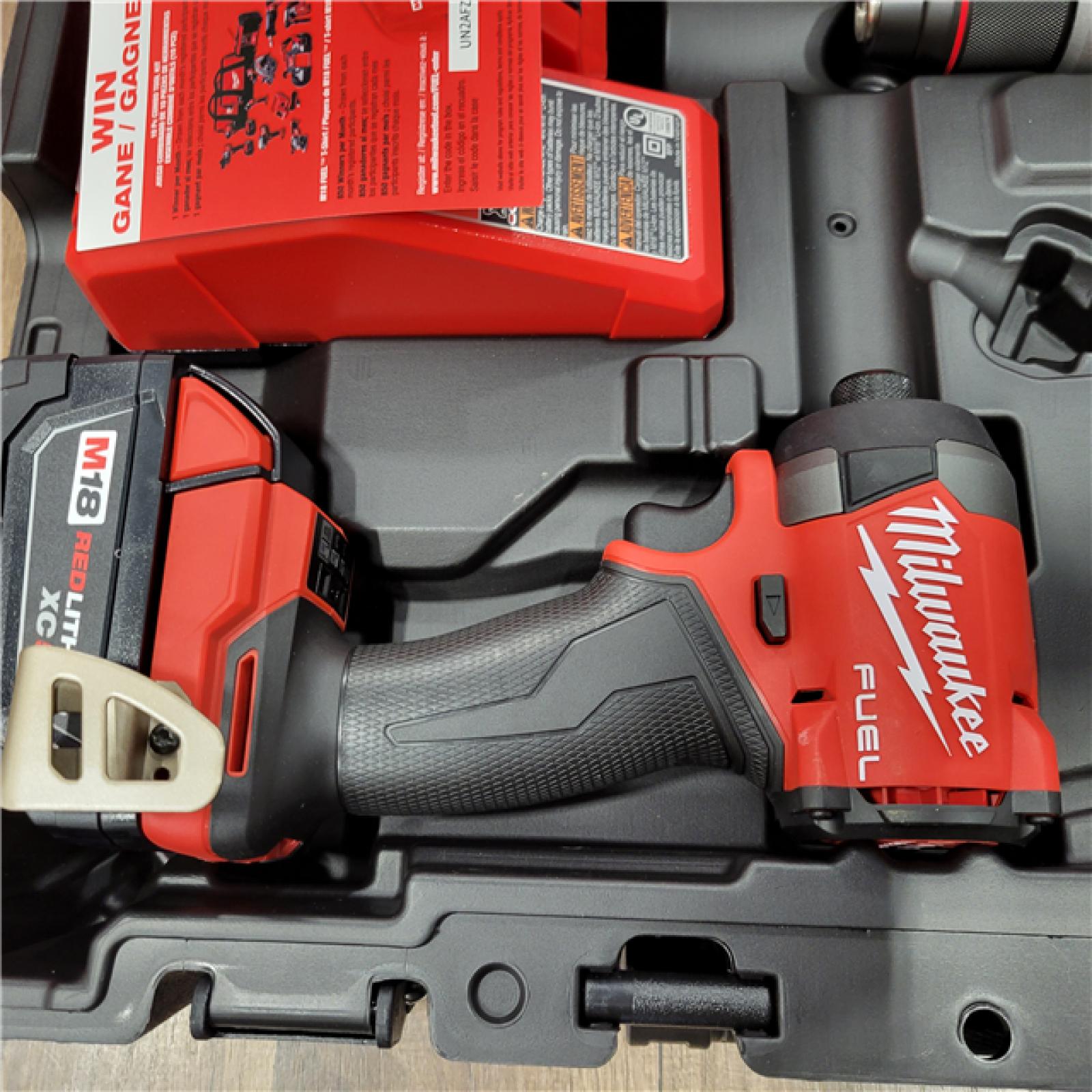 AS-IS MILWAUKEE M18 FUEL 18V Lithium-Ion Brushless Cordless Hammer Drill and Impact Driver Combo Kit (2-Tool) with 2 Batteries