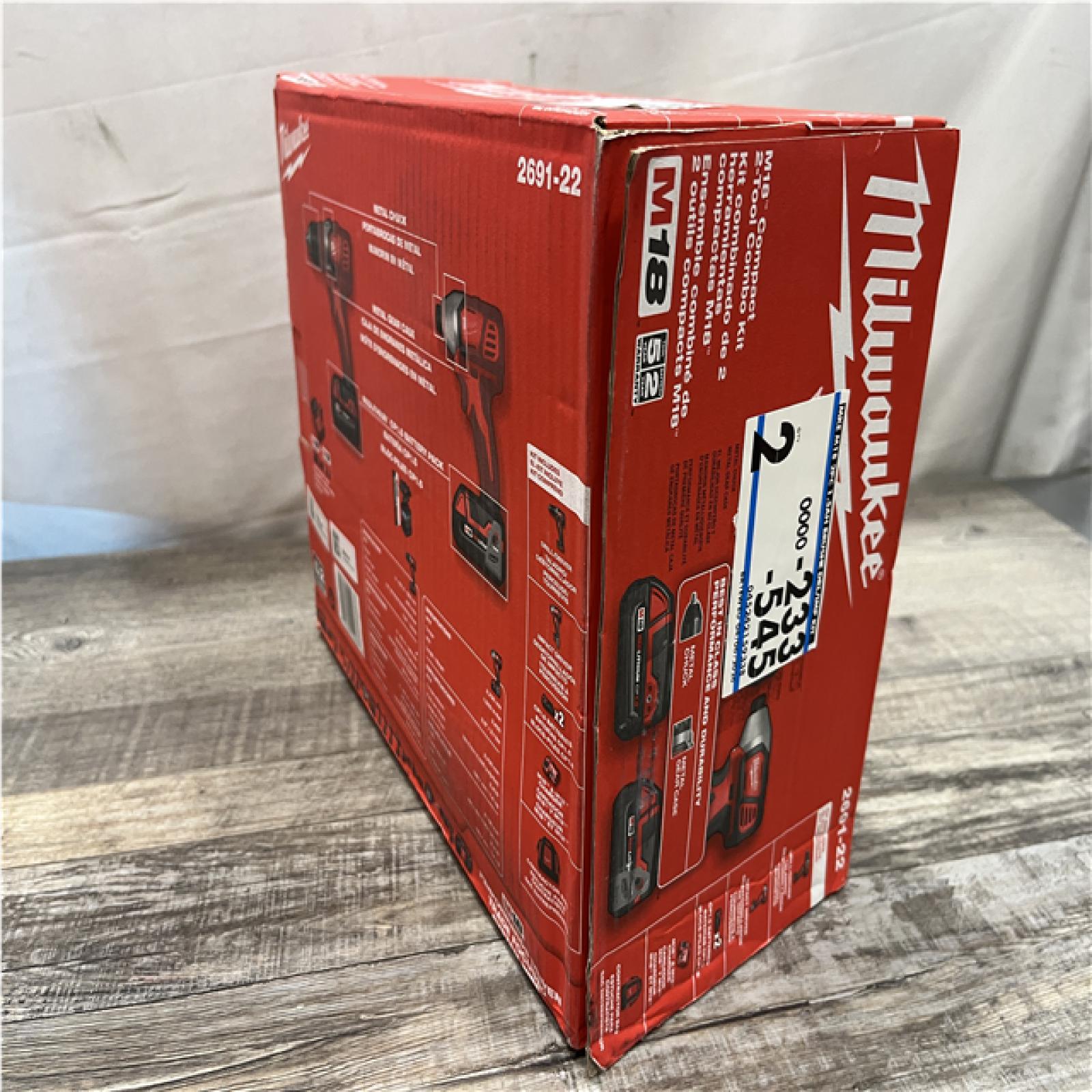 NEW - Milwaukee 18V Lithium-Ion Cordless Drill Driver/Impact Driver Combo Kit