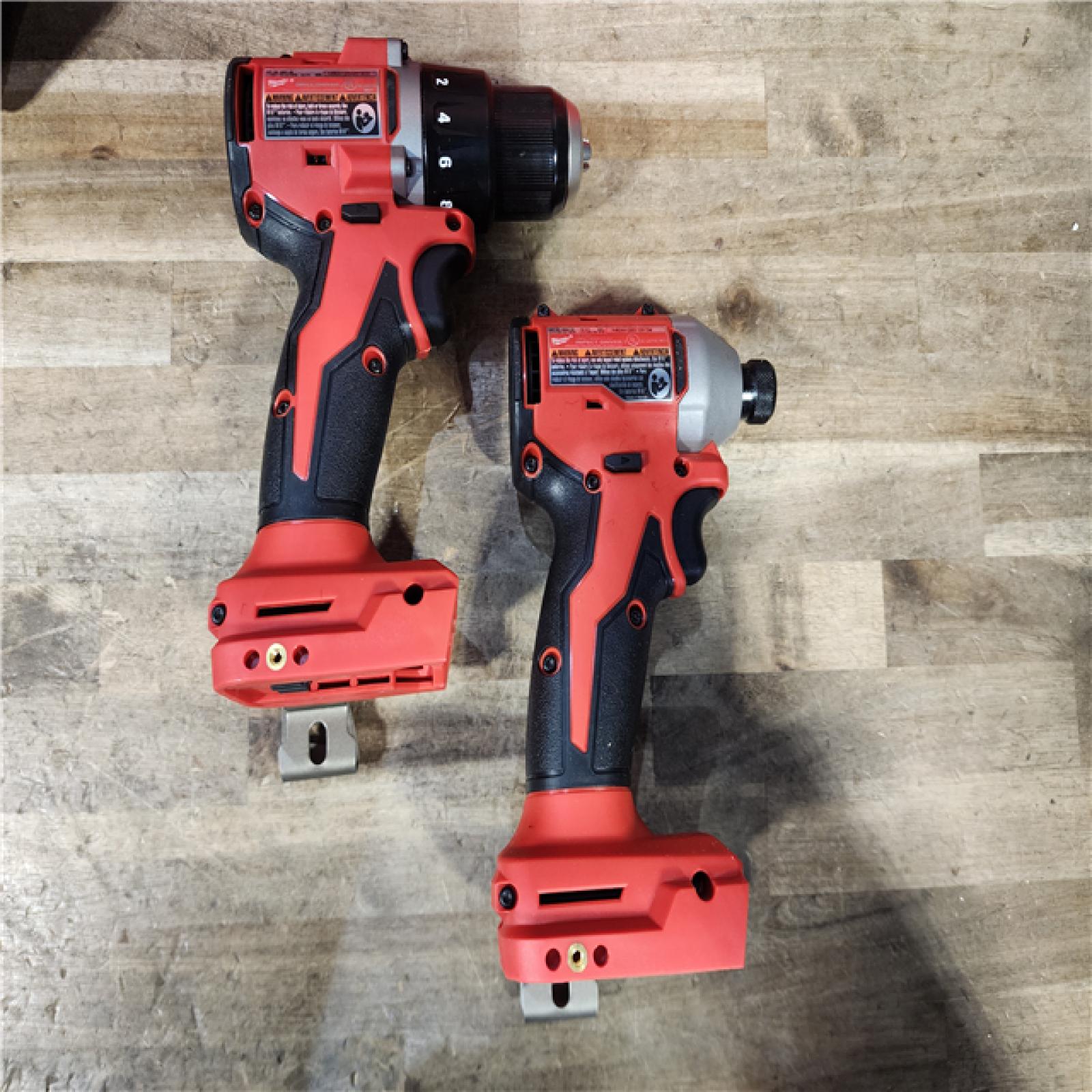 HOUSTON LOCATION - AS-IS Milwaukee M18 18V Lithium-Ion Brushless Cordless Compact Drill/Impact Combo Kit (2-Tool) W/(2) 2.0 Ah Batteries  Charger & Bag