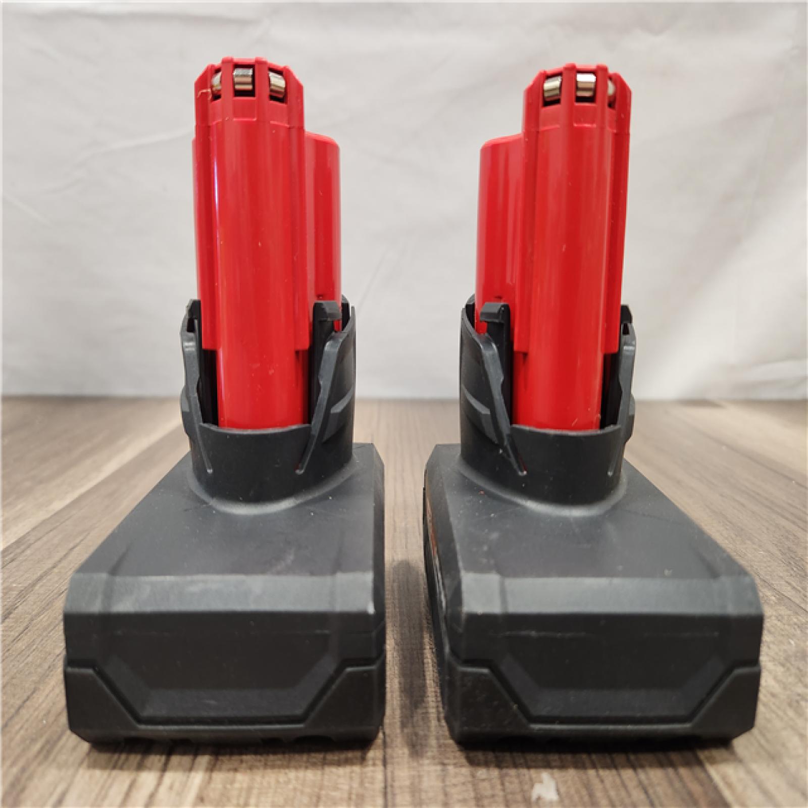 AS-IS- Milwaukee M12 12V Lithium-Ion XC High Output 5.0 Ah Battery Pack (2-Pack) Starter Kit with Charger