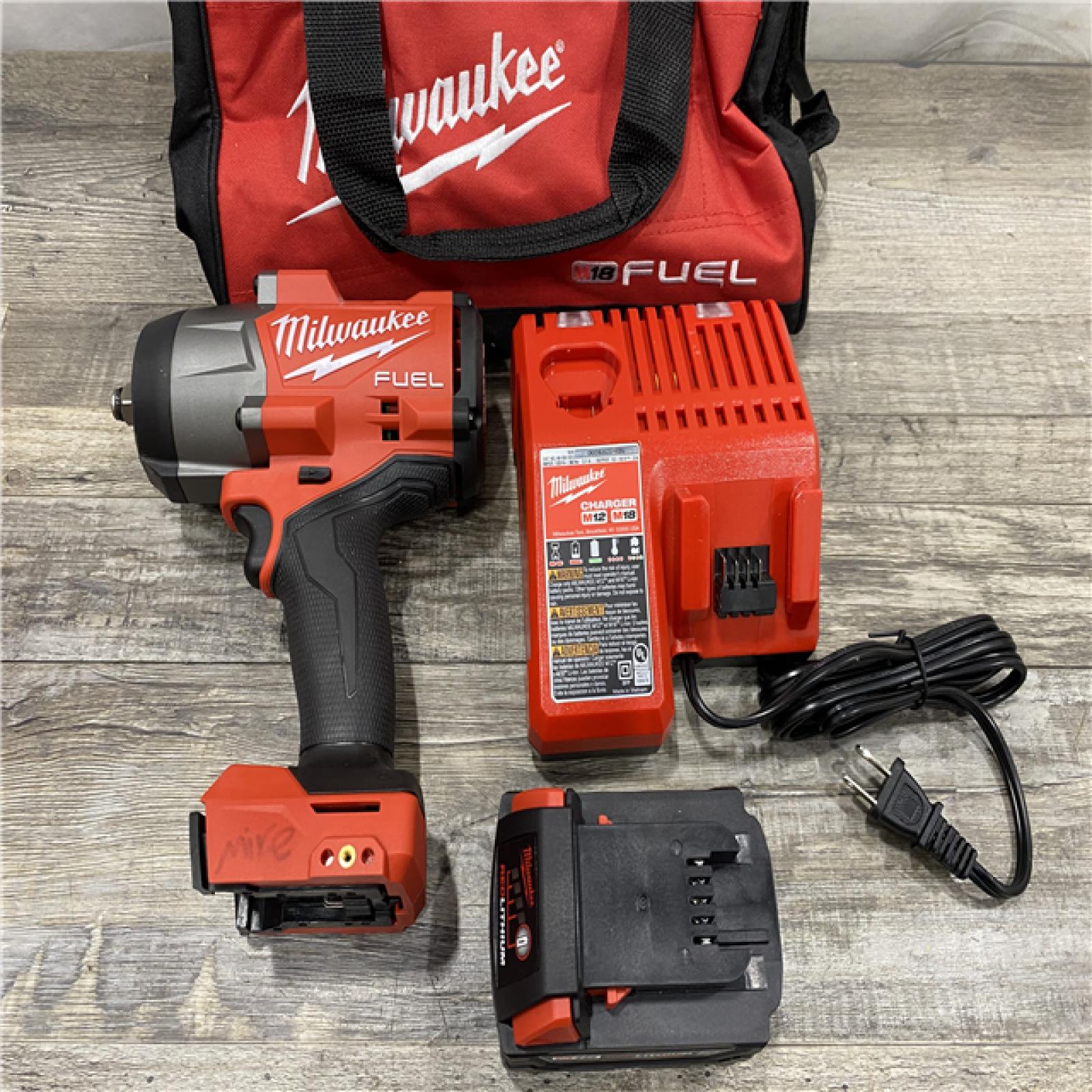 AS-IS Milwaukee FUEL 1/2 High Torque Impact Wrench with Friction Ring Kit