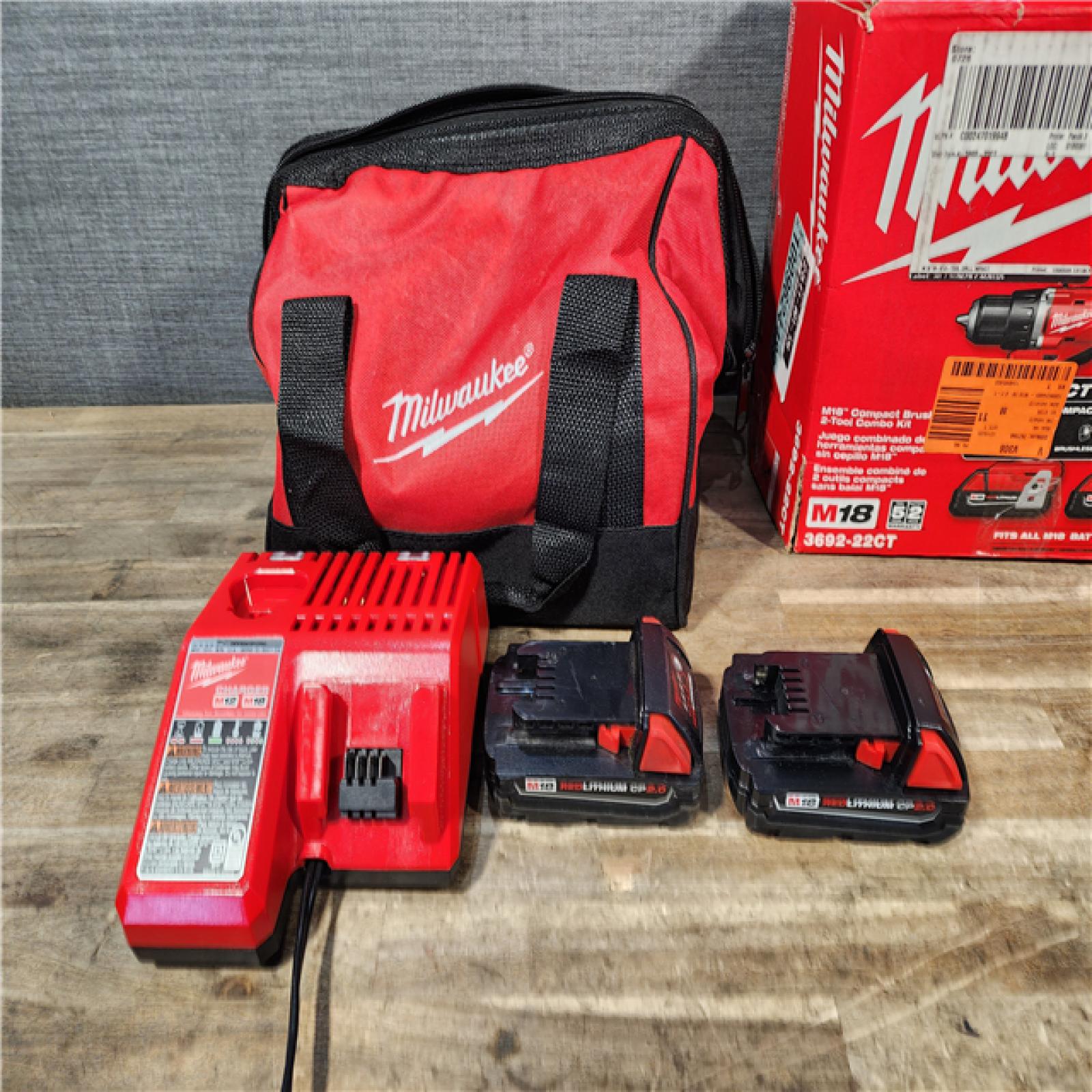 HOUSTON LOCATION - AS-IS Milwaukee M18 18V Lithium-Ion Brushless Cordless Compact Drill/Impact Combo Kit (2-Tool) W/(2) 2.0 Ah Batteries  Charger & Bag