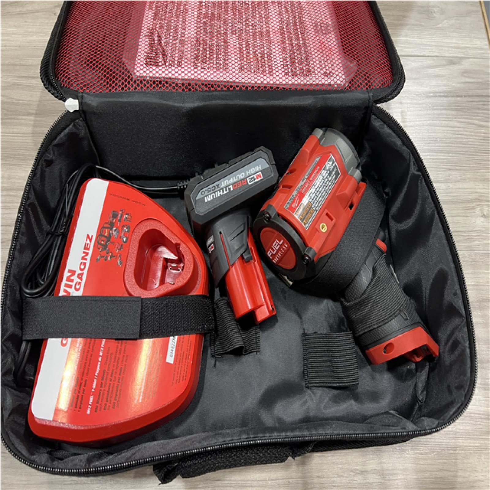 AS-IS Milwaukee FUEL 12V Li-Ion Brushless Cordless Stubby 3/8 in. Impact Wrench Kit
