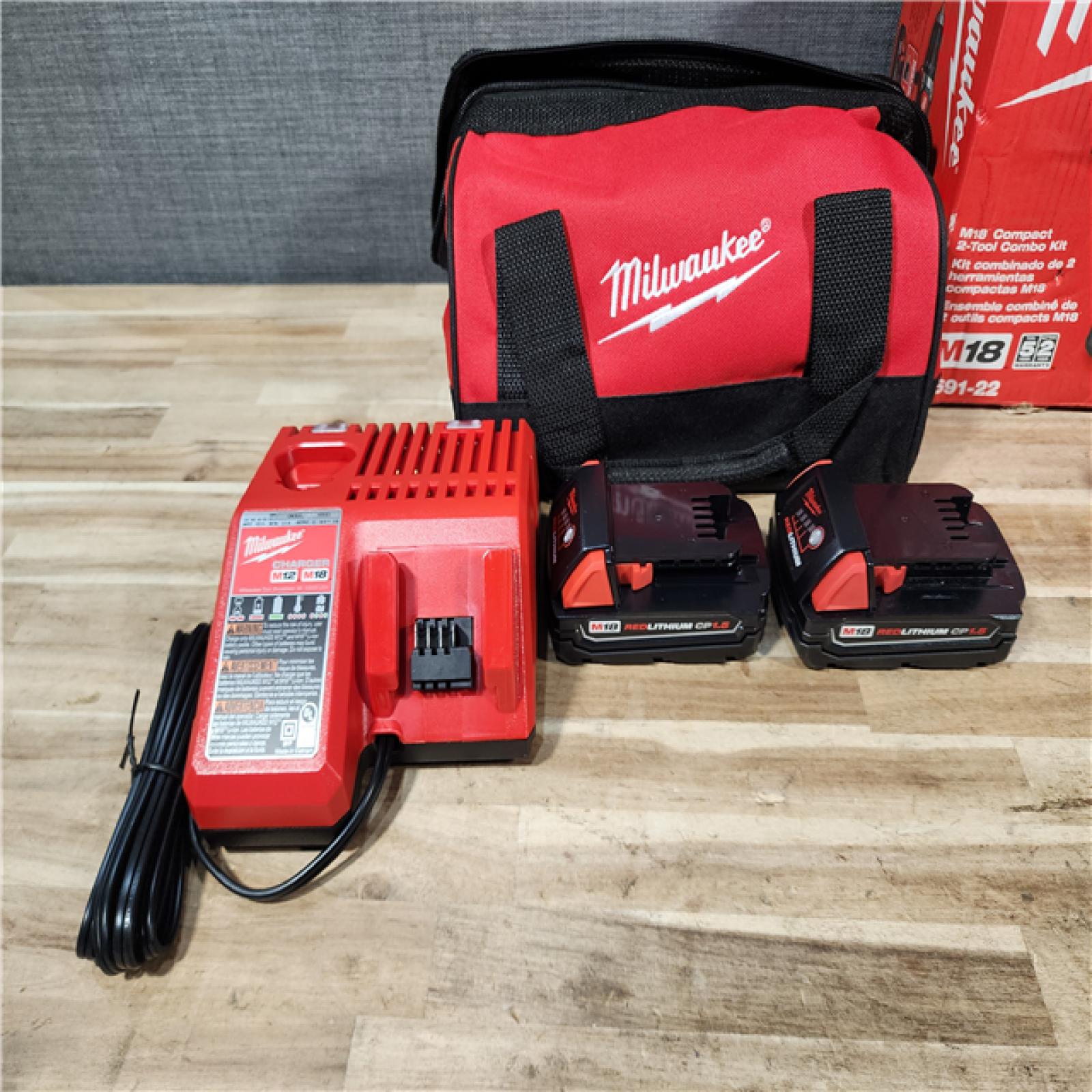 HOUSTON LOCATION - AS-IS Milwaukee 18V Lithium-Ion Cordless Drill Driver/Impact Driver Combo Kit