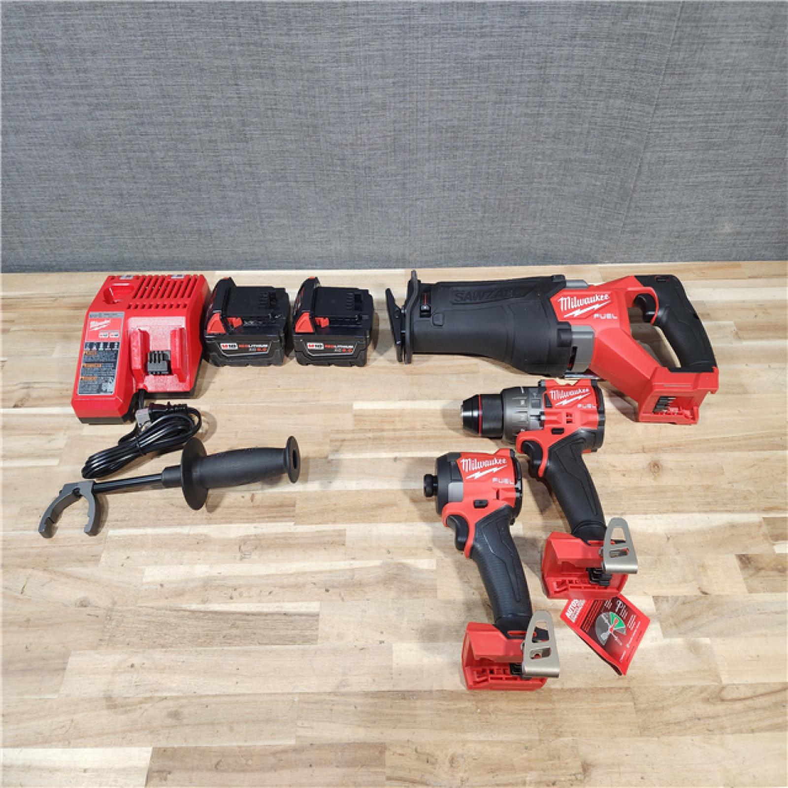 HOUSTON LOCATION - AS-IS M18 FUEL 18V Lithium-Ion Brushless Cordless Combo Kit (3-Tool) with Two 5.0 Ah Batteries  1 Charger 1 Tool Bag