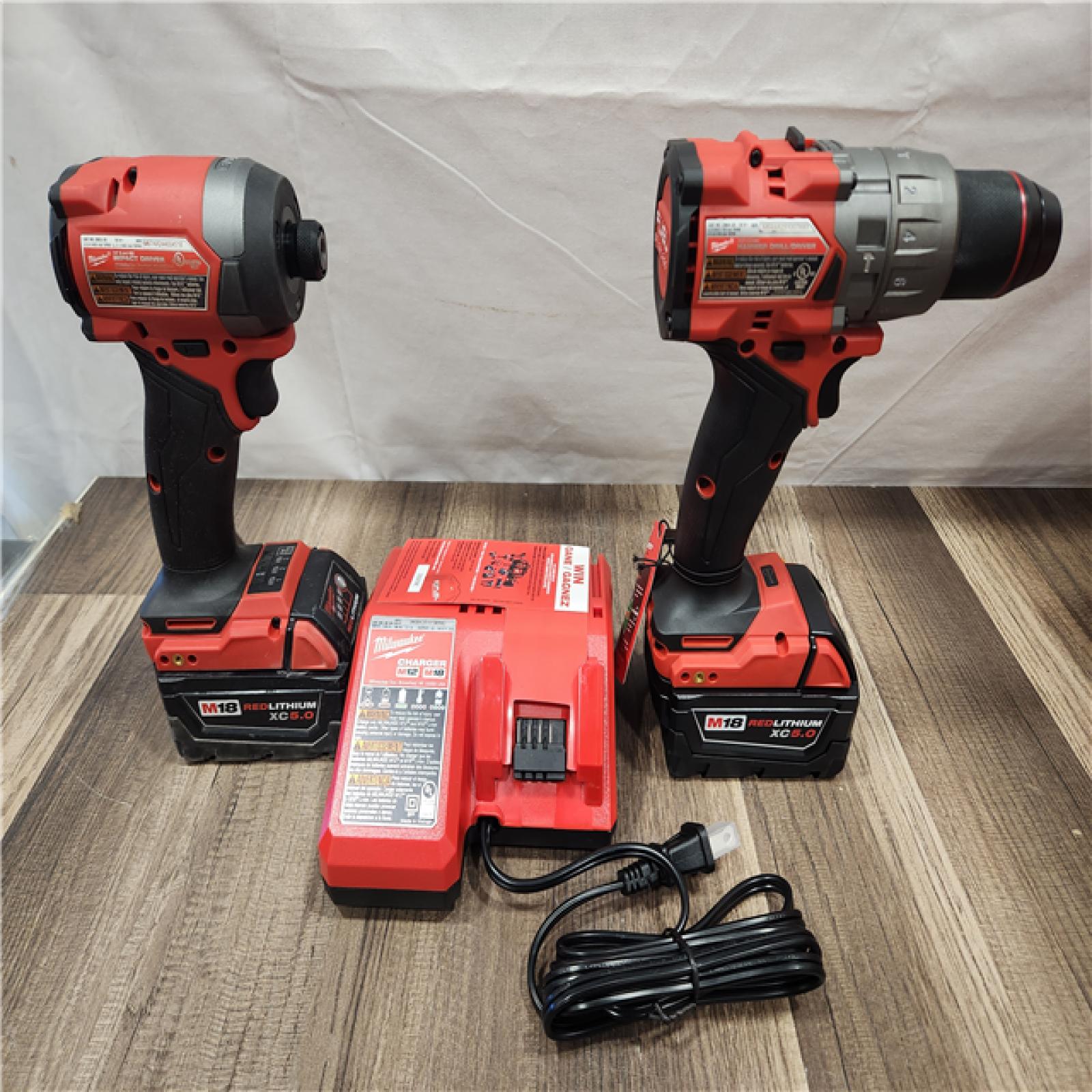 AS-IS- MILWAUKEE FUEL 18V Lithium-Ion Brushless Cordless Hammer Drill and Impact Driver Combo Kit