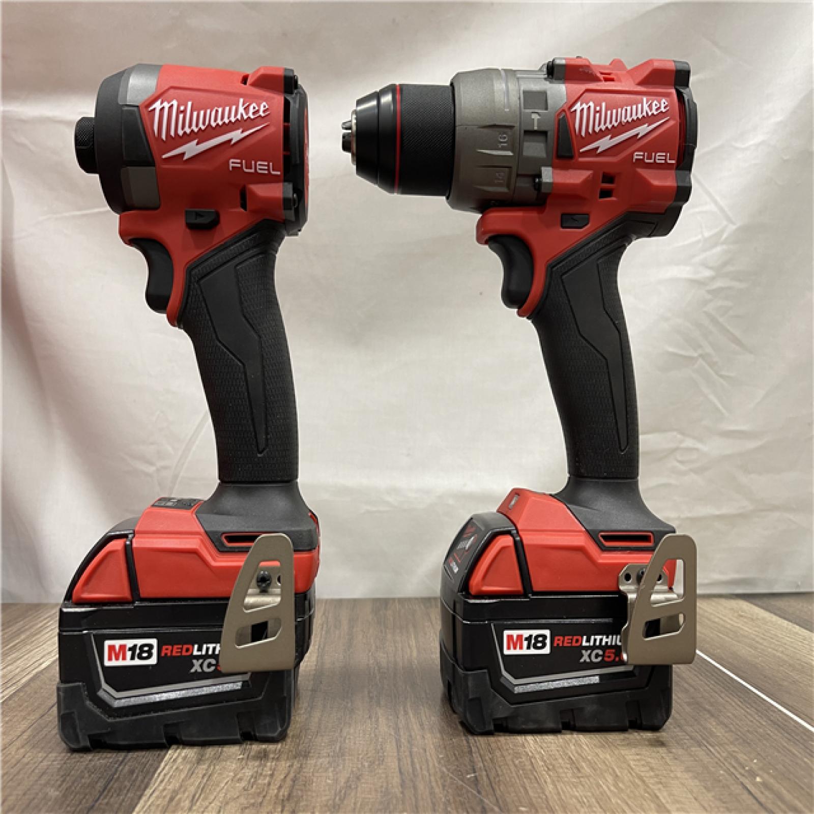 AS-IS Milwaukee  FUEL 18V Lithium-Ion Brushless Cordless Hammer Drill and Impact Driver Combo Kit