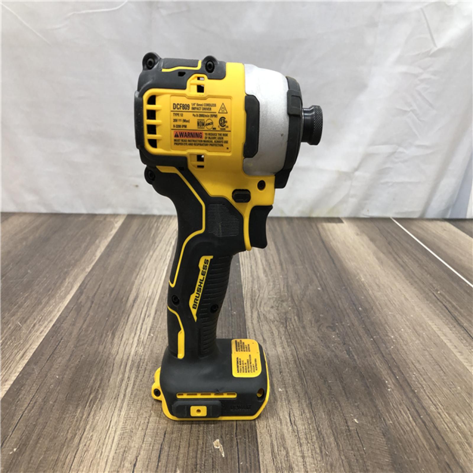AS-IS DEWALT ATOMIC 20V MAX Cordless Brushless Compact 1/4 in. Impact Driver (Tool Only)