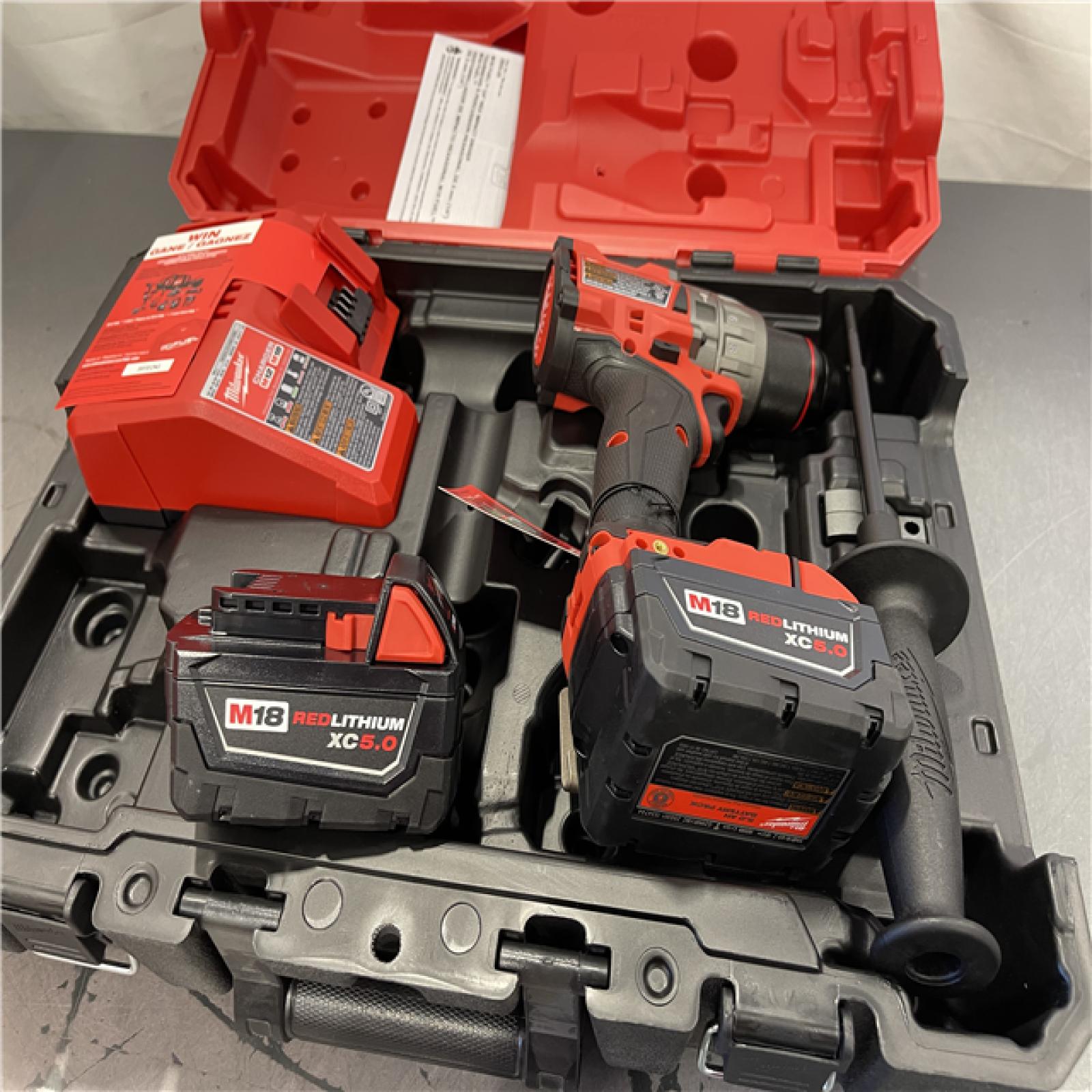 AS-IS - Milwaukee M18 FUEL 18-Volt Lithium-Ion Brushless Cordless 1/2 in. Hammer Drill/Driver Kit