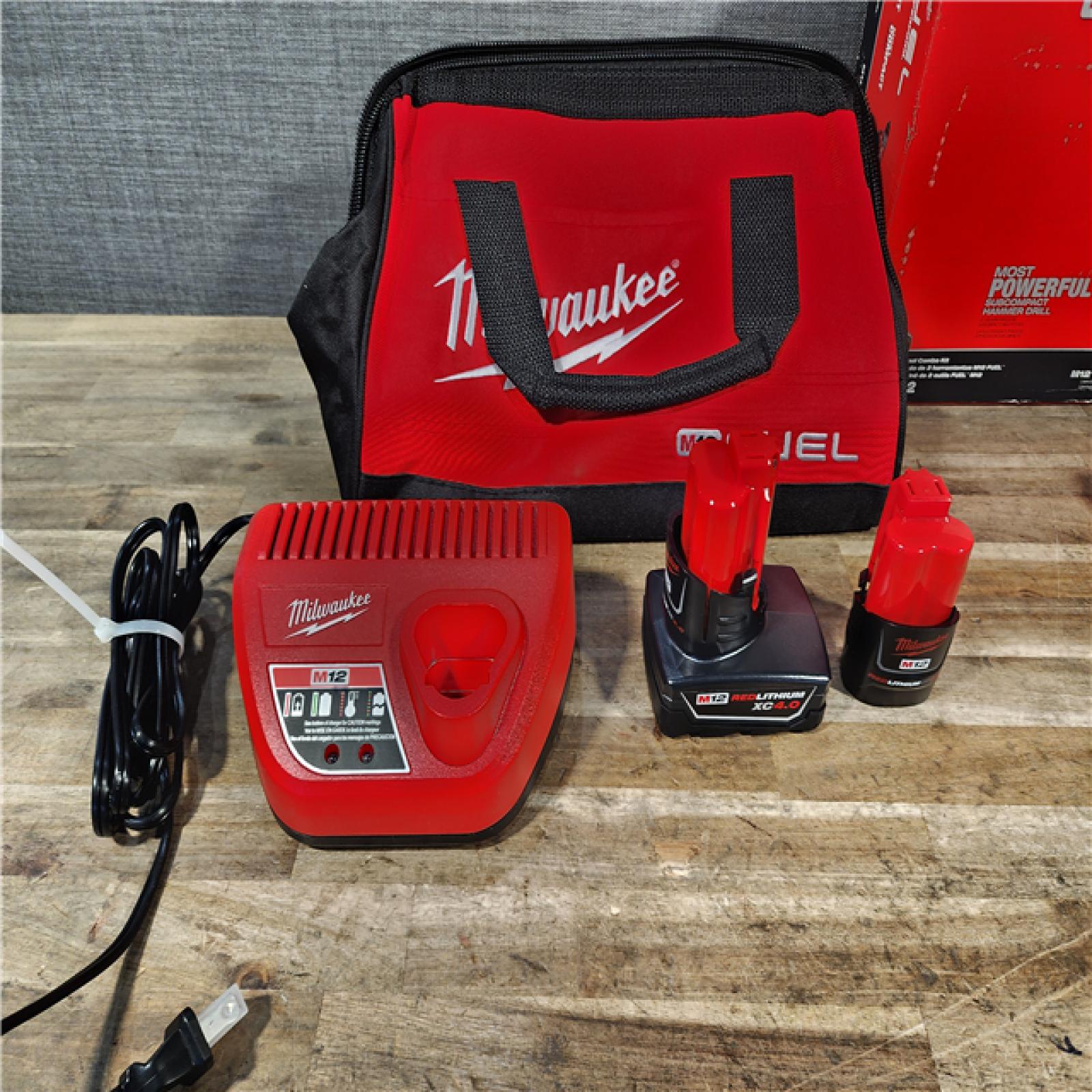 HOUSTON LOCATION - AS-IS Milwaukee FUEL 12-Volt Lithium-Ion Brushless Cordless Hammer Drill and Impact Driver Combo Kit